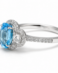 Three Stone Diamond Halo Ring Featuring Blue Topaz