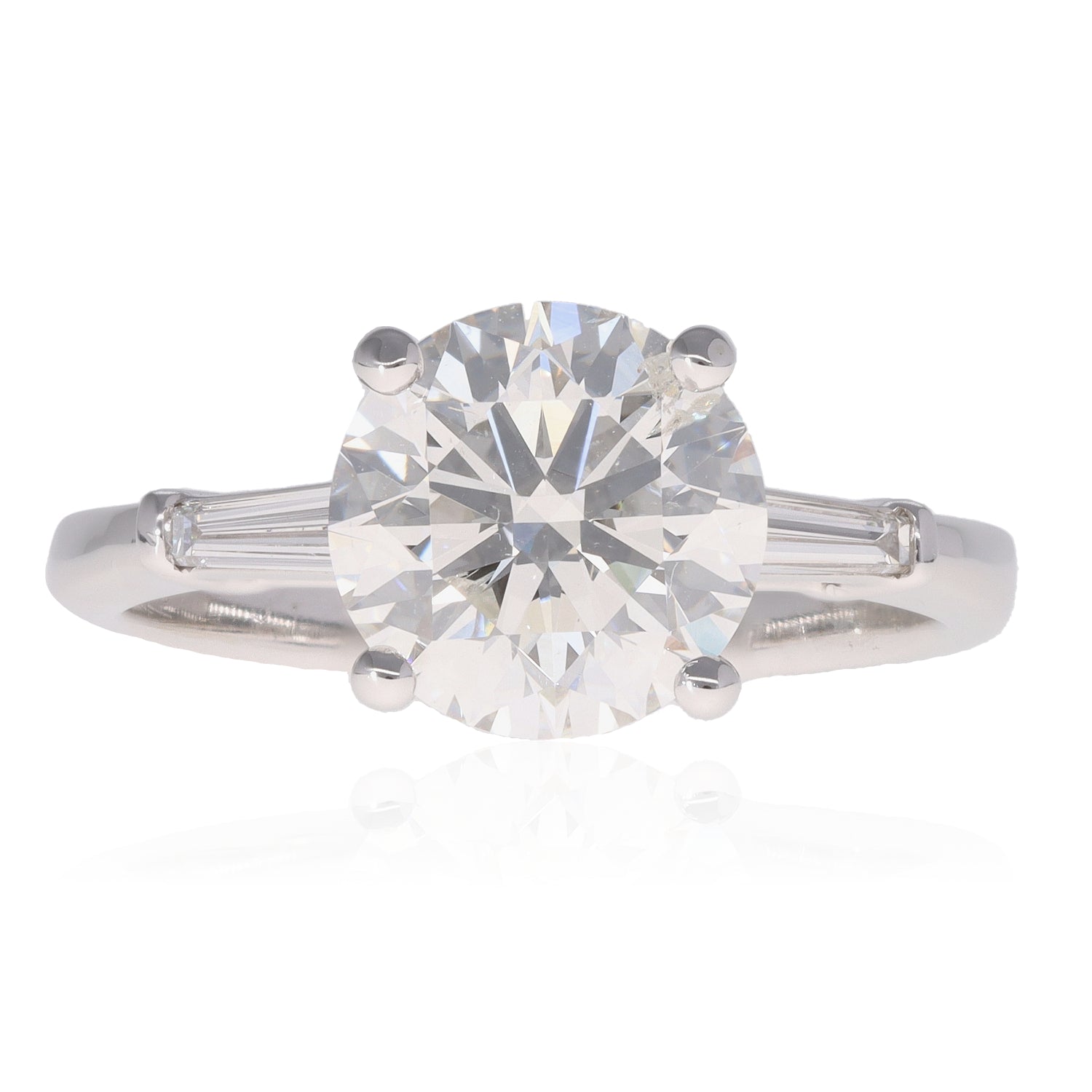 Round &amp; Baguette Diamond Three Stone Ring