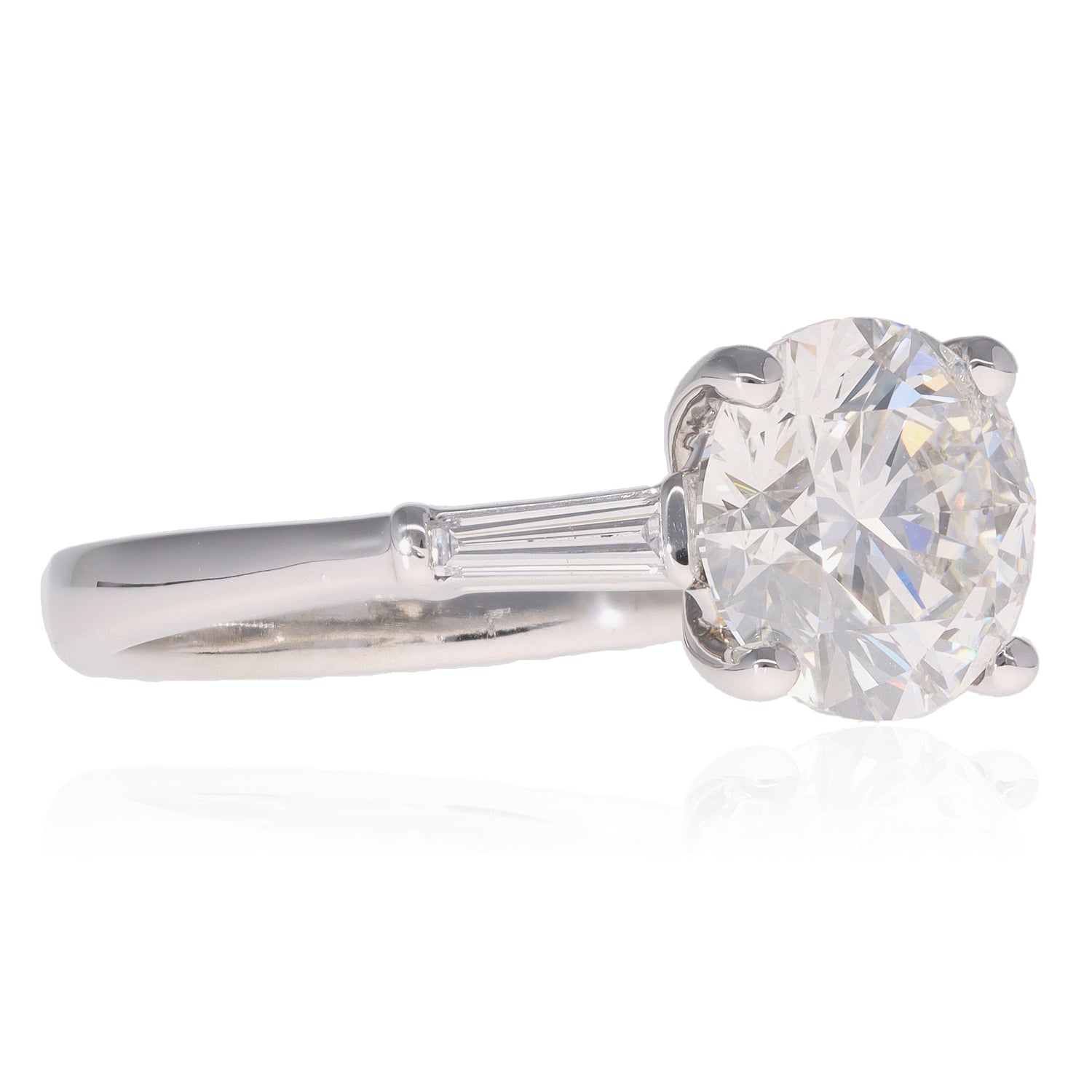 Round &amp; Baguette Diamond Three Stone Ring