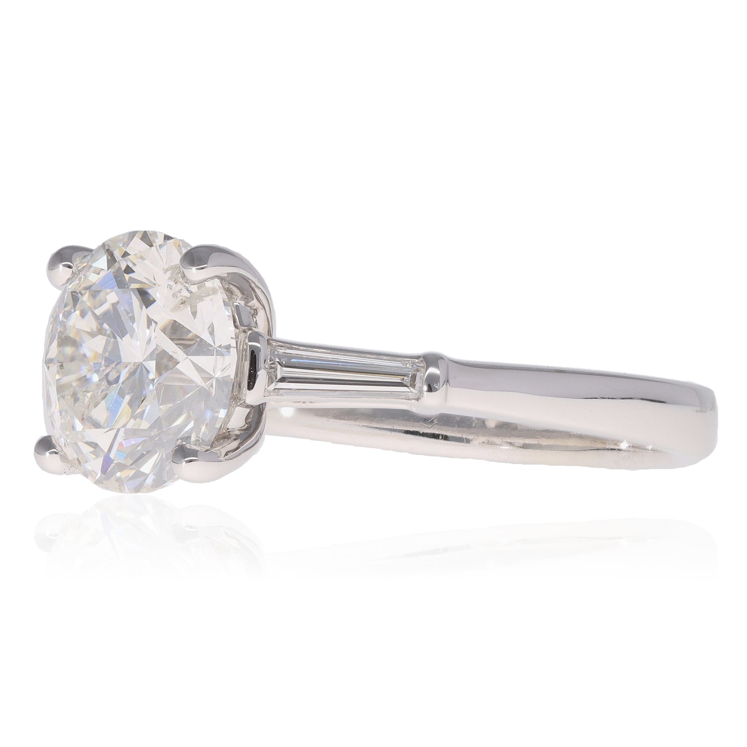 Round &amp; Baguette Diamond Three Stone Ring