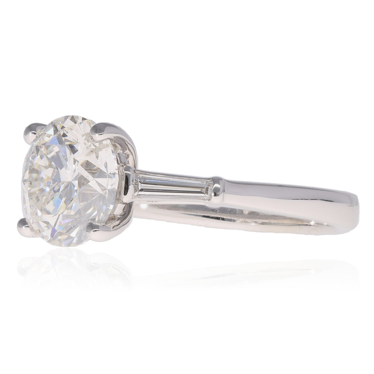 Round &amp; Baguette Diamond Three Stone Ring