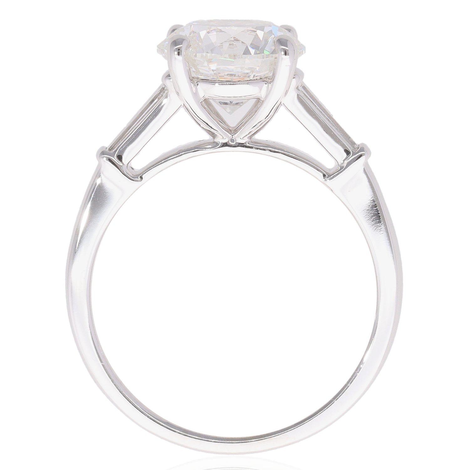 Round &amp; Baguette Diamond Three Stone Ring