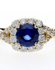 14K Yellow .97ct Round Sapphire Halo Ring with Twisted Band D=0.60ctw
