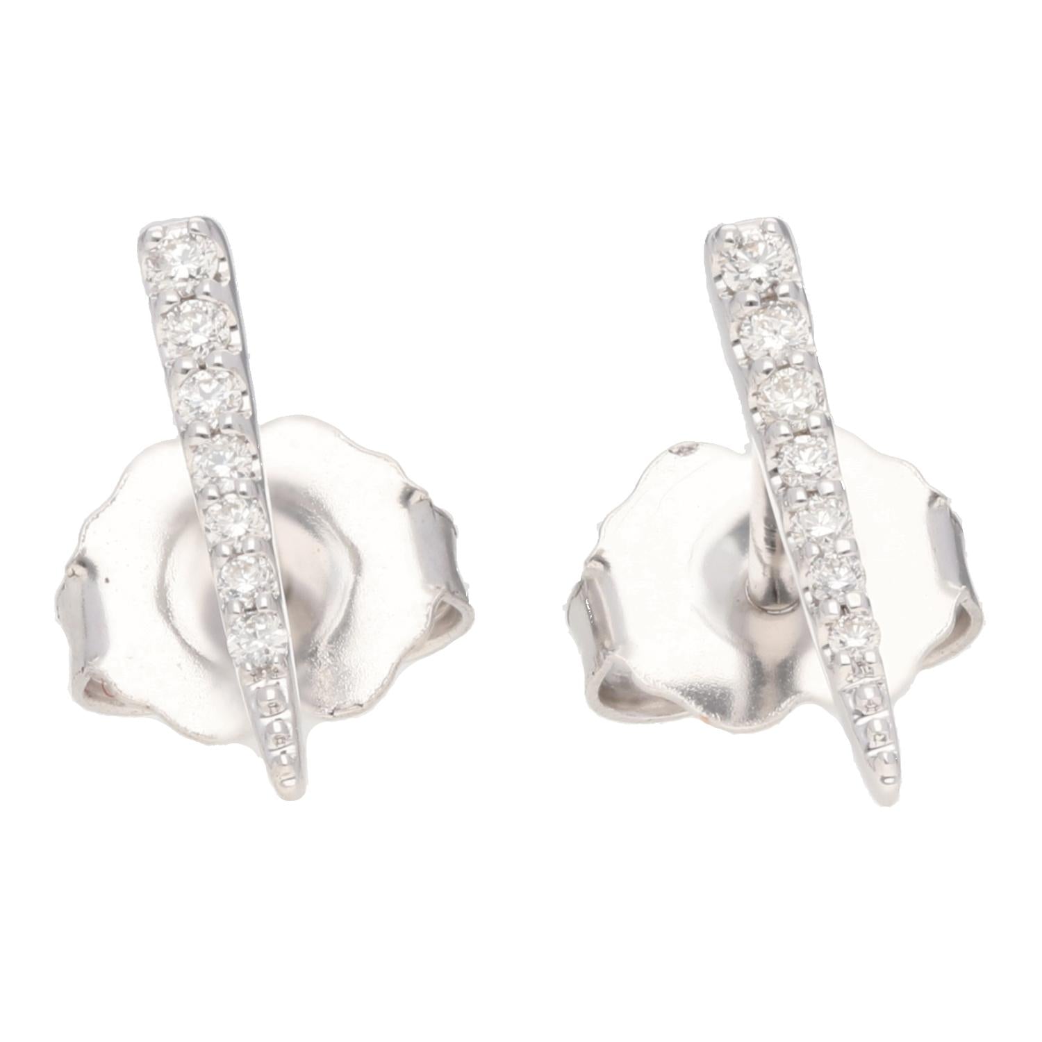14K White Gold Graduated Diamond Dagger Stud Earrings Modern Chic Style