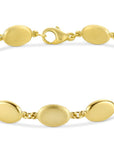 14K Yellow Gold Medallion Bracelet Satin Polished 6.5in 5.9g Elegant