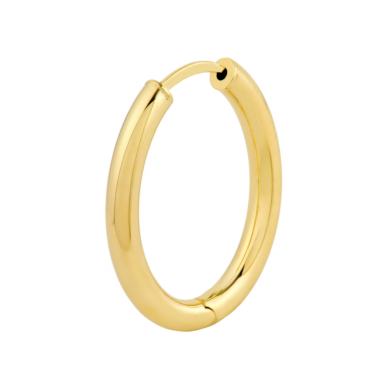Gold hoop earring on a white background