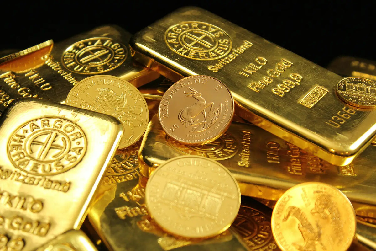 Gold bars , bullion and coins with visible branding on a dark background