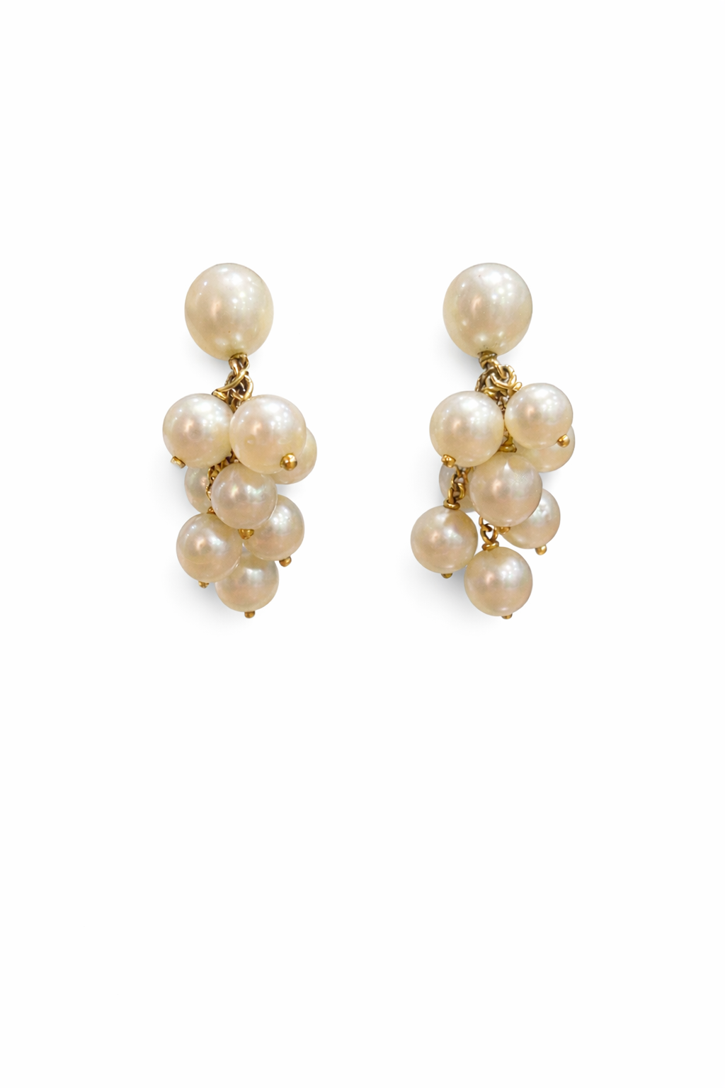 Pair of pearl earrings on a white background